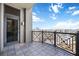 Balcony with decorative iron railing and skyline views at 50 Central Ave # 17Phb, Sarasota, FL 34236