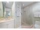 Bathroom with large glass shower and vanity at 50 Central Ave # 17Phb, Sarasota, FL 34236