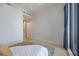 Bright bedroom with natural light and minimalist design, complemented by neutral tones and a sliding glass door at 50 Central Ave # 17Phb, Sarasota, FL 34236