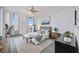 Bright bedroom featuring ample natural light, comfortable bed, and city views at 50 Central Ave # 17Phb, Sarasota, FL 34236