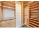 Organized walk-in closet with custom shelving, drawers, and hanging rods at 50 Central Ave # 17Phb, Sarasota, FL 34236