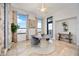 Dining area with floor to ceiling windows, chic lighting, and modern decor at 50 Central Ave # 17Phb, Sarasota, FL 34236