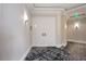 Elegant entrance featuring double doors and modern flooring at 50 Central Ave # 17Phb, Sarasota, FL 34236