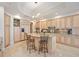 Gourmet kitchen features stone counters, stainless appliances, and a center island at 50 Central Ave # 17Phb, Sarasota, FL 34236