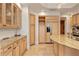 Well-designed kitchen showcases ample cabinetry and a granite-topped island at 50 Central Ave # 17Phb, Sarasota, FL 34236