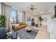 Bright living room boasts large windows, modern furnishings, and open floor plan at 50 Central Ave # 17Phb, Sarasota, FL 34236
