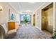 Exclusive lobby with stylish seating area, elevators, and city views at 50 Central Ave # 17Phb, Sarasota, FL 34236