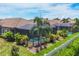 Backyard view showcasing a private pool and lush landscaping at 5732 Puccini St, Nokomis, FL 34275