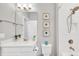 Clean bathroom with white vanity and bathtub at 5732 Puccini St, Nokomis, FL 34275