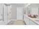 Modern bathroom with double vanity and walk-in shower at 5732 Puccini St, Nokomis, FL 34275