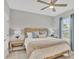 King-size bed in bright bedroom with blue accents at 5732 Puccini St, Nokomis, FL 34275