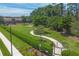 Relaxing park with walking paths and benches at 5732 Puccini St, Nokomis, FL 34275