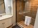 Modern bathroom with large walk-in shower and stylish tile at 3604 54Th W Dr # 103, Bradenton, FL 34210