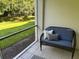Spacious screened porch with comfortable seating, perfect for relaxation at 3604 54Th W Dr # 103, Bradenton, FL 34210