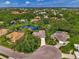 Bird's eye view of a single-Gathering home nestled in a tranquil, tree-lined neighborhood at 427 Autumn Chase Dr, Venice, FL 34292