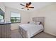Bright bedroom with a comfortable bed and large window at 17006 Blue Ridge Pl, Lakewood Ranch, FL 34211