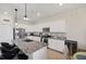 Kitchen with white cabinets, granite countertops, and stainless steel appliances at 17006 Blue Ridge Pl, Lakewood Ranch, FL 34211