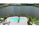 Resort-style pool with surrounding patio and lush landscaping at 17006 Blue Ridge Pl, Lakewood Ranch, FL 34211