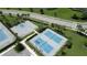 Aerial view of community amenities including pickleball and basketball courts at 17006 Blue Ridge Pl, Lakewood Ranch, FL 34211