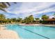Inviting community pool with lounge chairs at 5732 Puccini St, Nokomis, FL 34275