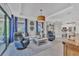 Bright and spacious living room with comfortable seating and an open floor plan at 5732 Puccini St, Nokomis, FL 34275