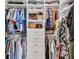 Large walk-in closet with ample shelving and hanging space at 5732 Puccini St, Nokomis, FL 34275