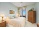 Spacious bedroom with king-size bed and built-in wardrobe at 50 Central Ave # 17Phb, Sarasota, FL 34236