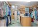 Large walk-in closet with ample shelving and hanging space at 50 Central Ave # 17Phb, Sarasota, FL 34236