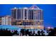 Luxury high-rise building at night, showcasing city views at 50 Central Ave # 17Phb, Sarasota, FL 34236