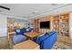 Community library with ample seating and built-in bookshelves at 50 Central Ave # 17Phb, Sarasota, FL 34236