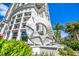 Modern high-rise building with a unique star-shaped sculpture at 50 Central Ave # 17Phb, Sarasota, FL 34236