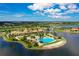 Resort-style community with pool, tennis courts, and lake views at 118 Veraza Ct, Nokomis, FL 34275