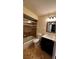 Clean bathroom with tub/shower combo and vanity at 6033 34Th W St # 1, Bradenton, FL 34210