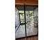 Enclosed patio with glass doors and outdoor furniture at 6033 34Th W St # 1, Bradenton, FL 34210