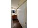 Bright bathroom with updated vanity and sliding door to closet at 6033 34Th W St # 1, Bradenton, FL 34210