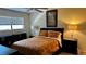 Bedroom with double bed and window coverings at 6033 34Th W St # 1, Bradenton, FL 34210