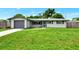Updated ranch home with a large grassy yard at 2900 Siesta Dr, Venice, FL 34293