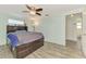 Bright bedroom with a double bed and access to bathroom at 2900 Siesta Dr, Venice, FL 34293
