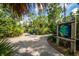 Community nature trail with informational map and trash receptacle at 12444 Destin Loop, Venice, FL 34293