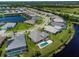 Home with private pool, located on a lake in a quiet neighborhood at 12444 Destin Loop, Venice, FL 34293