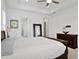 Spacious main bedroom with large windows, high ceilings, and a ceiling fan at 12444 Destin Loop, Venice, FL 34293