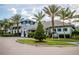 Elegant clubhouse with palm trees and landscaping at 12444 Destin Loop, Venice, FL 34293