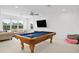 Fun game room with a pool table and comfortable seating at 12444 Destin Loop, Venice, FL 34293