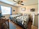 Guest bedroom with twin beds and ceiling fan at 461 Clover Rd, Venice, FL 34293