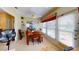Sunroom with table and chairs, offering bright space at 461 Clover Rd, Venice, FL 34293