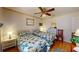 Guest bedroom with twin beds and ceiling fan at 461 Clover Rd, Venice, FL 34293
