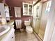Bathroom with shower, toilet and updated vanity at 461 Clover Rd, Venice, FL 34293