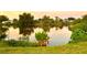 Scenic view of a peaceful canal with lush greenery at 461 Clover Rd, Venice, FL 34293