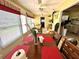 Sunroom dining area with access to backyard at 461 Clover Rd, Venice, FL 34293