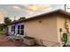 Backyard view of home exterior with patio at 461 Clover Rd, Venice, FL 34293